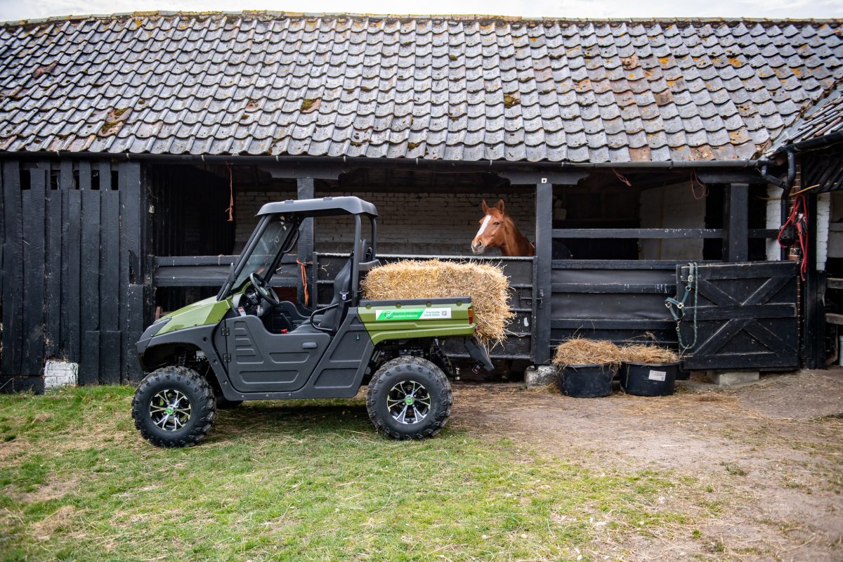 The Nipper UTV carrying hay bales feeding the farm animals