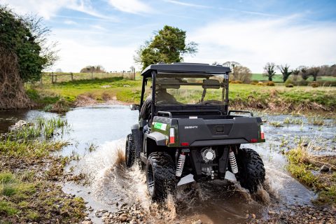 The HiSun Sector 5kW electric 4×4 driving through water