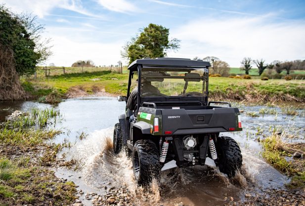 The HiSun Sector 5kW electric 4×4 driving through water